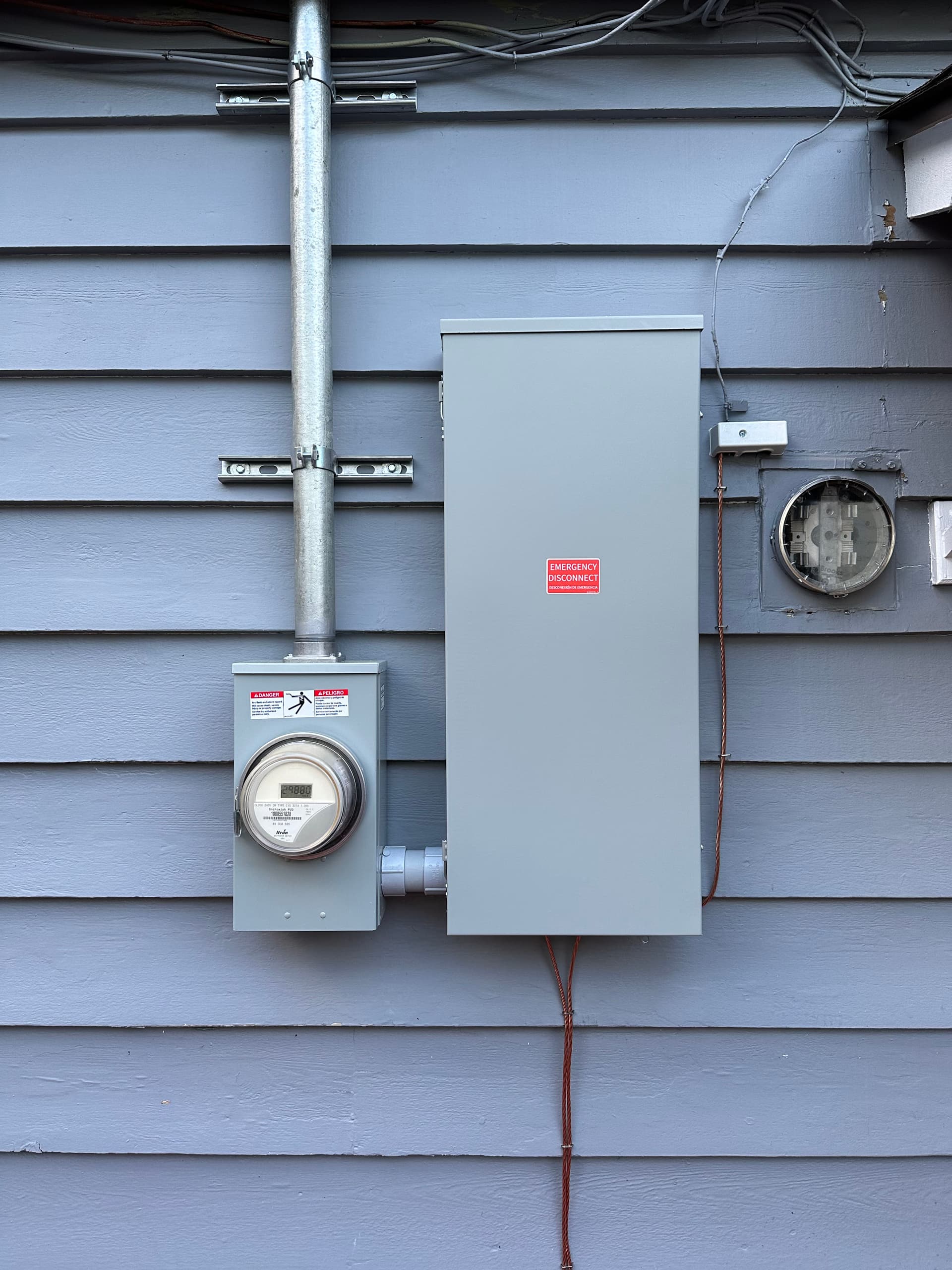 200 Amp Panel Upgrade and Relocation Done Right image