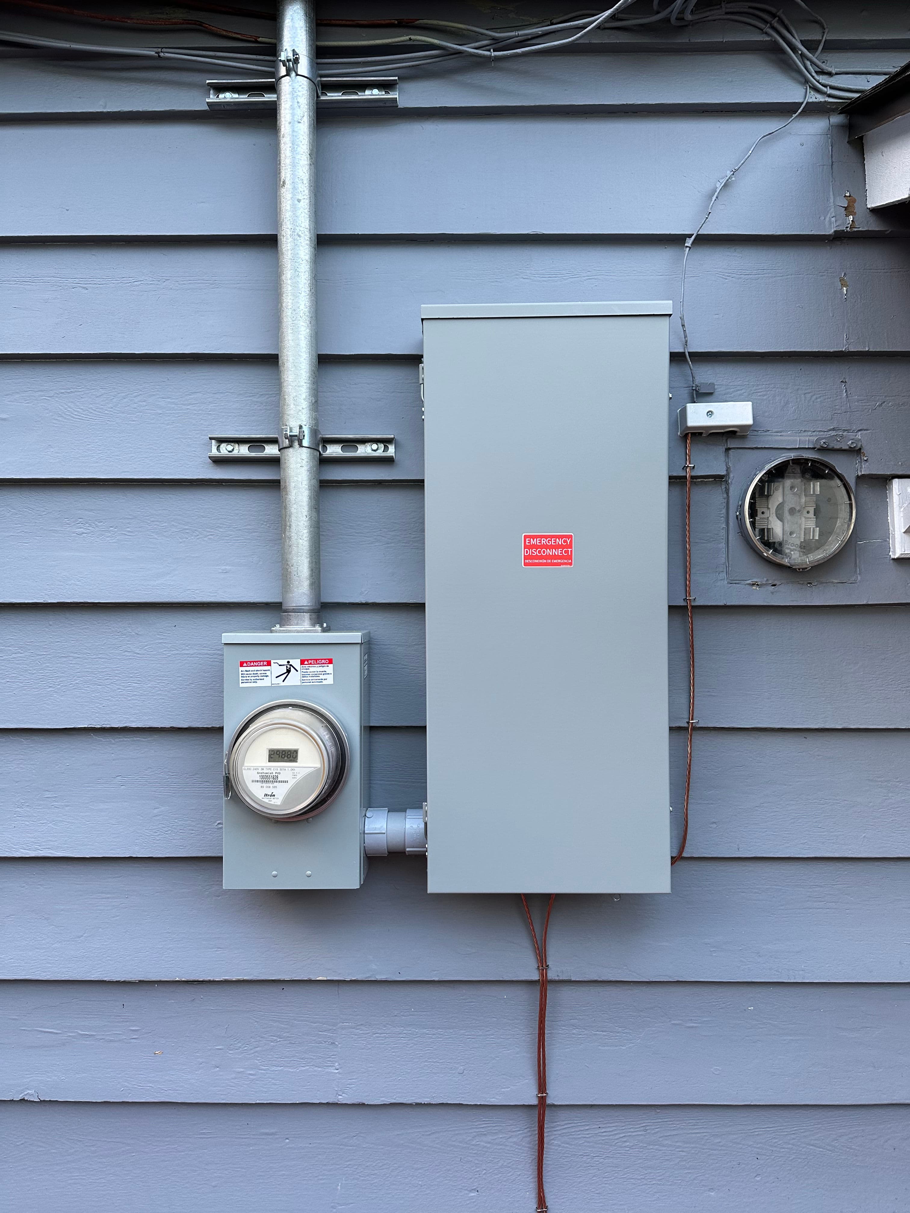 Project 200 Amp Panel Upgrade and Relocation Done Right image